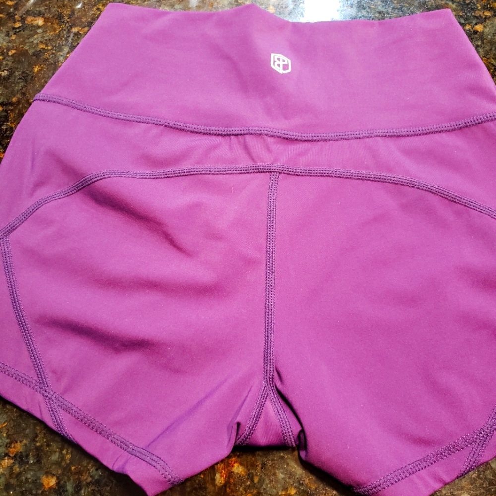 Born primitive dark purple shorts..size m